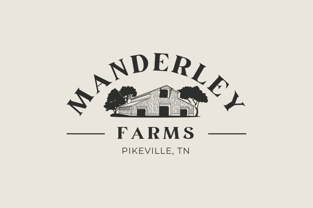sequatchie.cove.farm.tennessee.manderley.farms.partner.logo Logo of Manderley Farms, located in Pikeville, TN, featuring a rustic barn design with trees, conveying a sense of agricultural heritage and community.